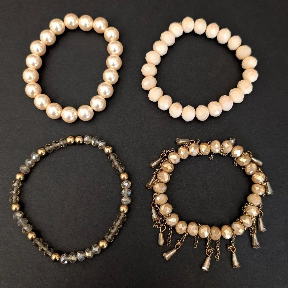 Bundle of nude and natural beaded stretch bracelets